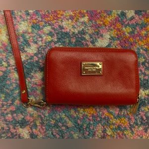 Used Michael Kors red wristlet wallet